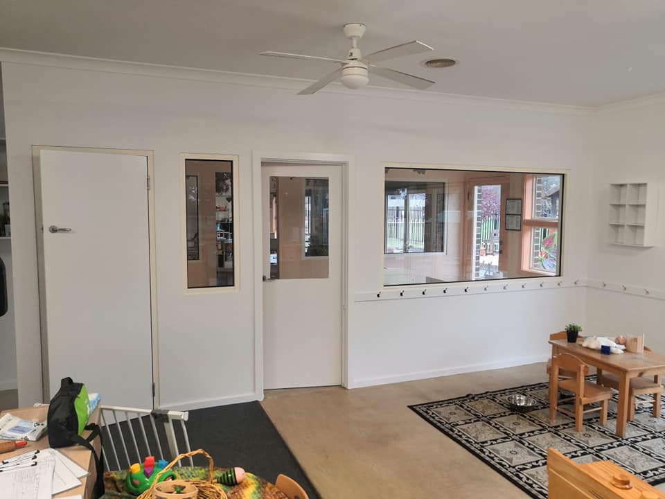 Interior residential painting showcasing clean modern house painting